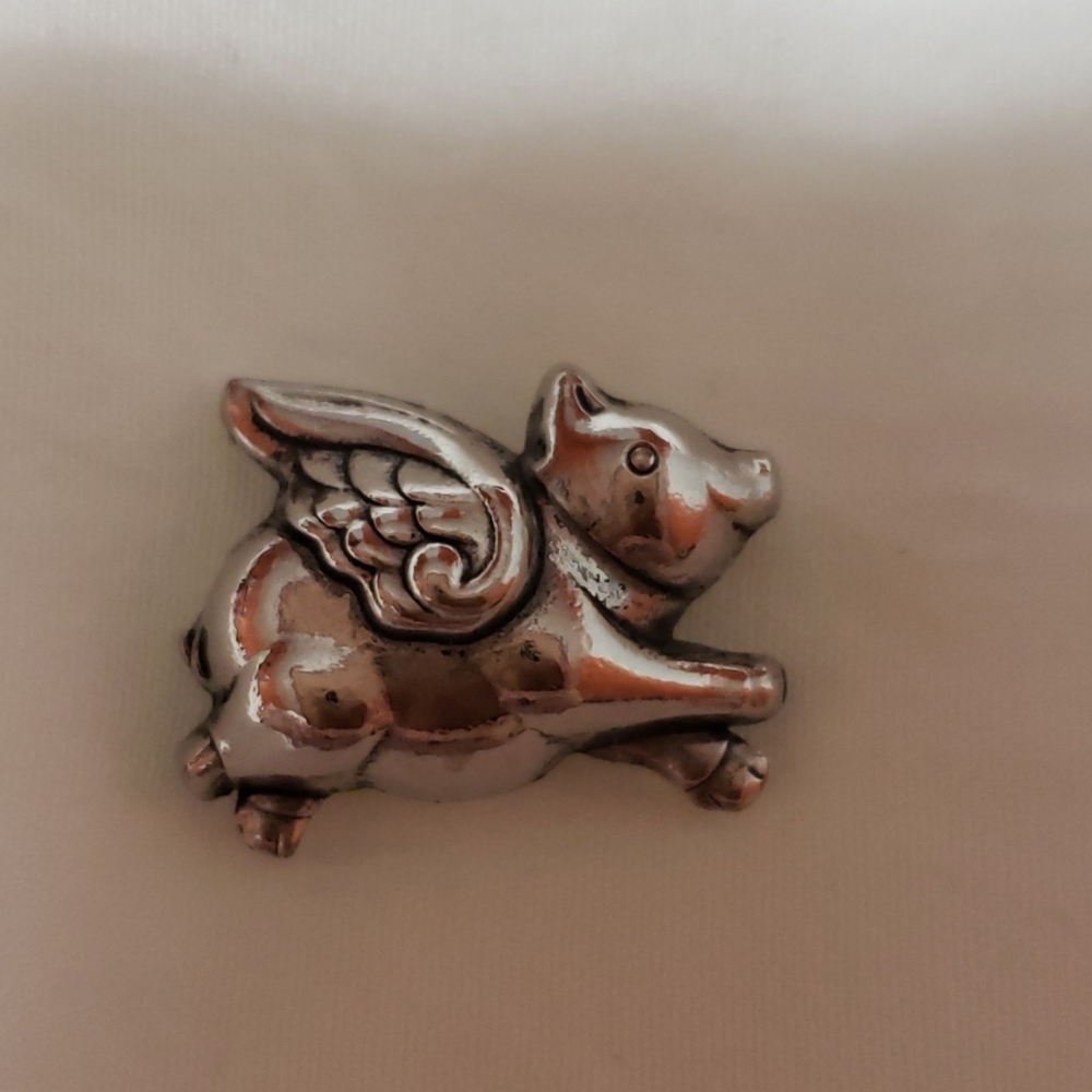 When pigs can fly charm